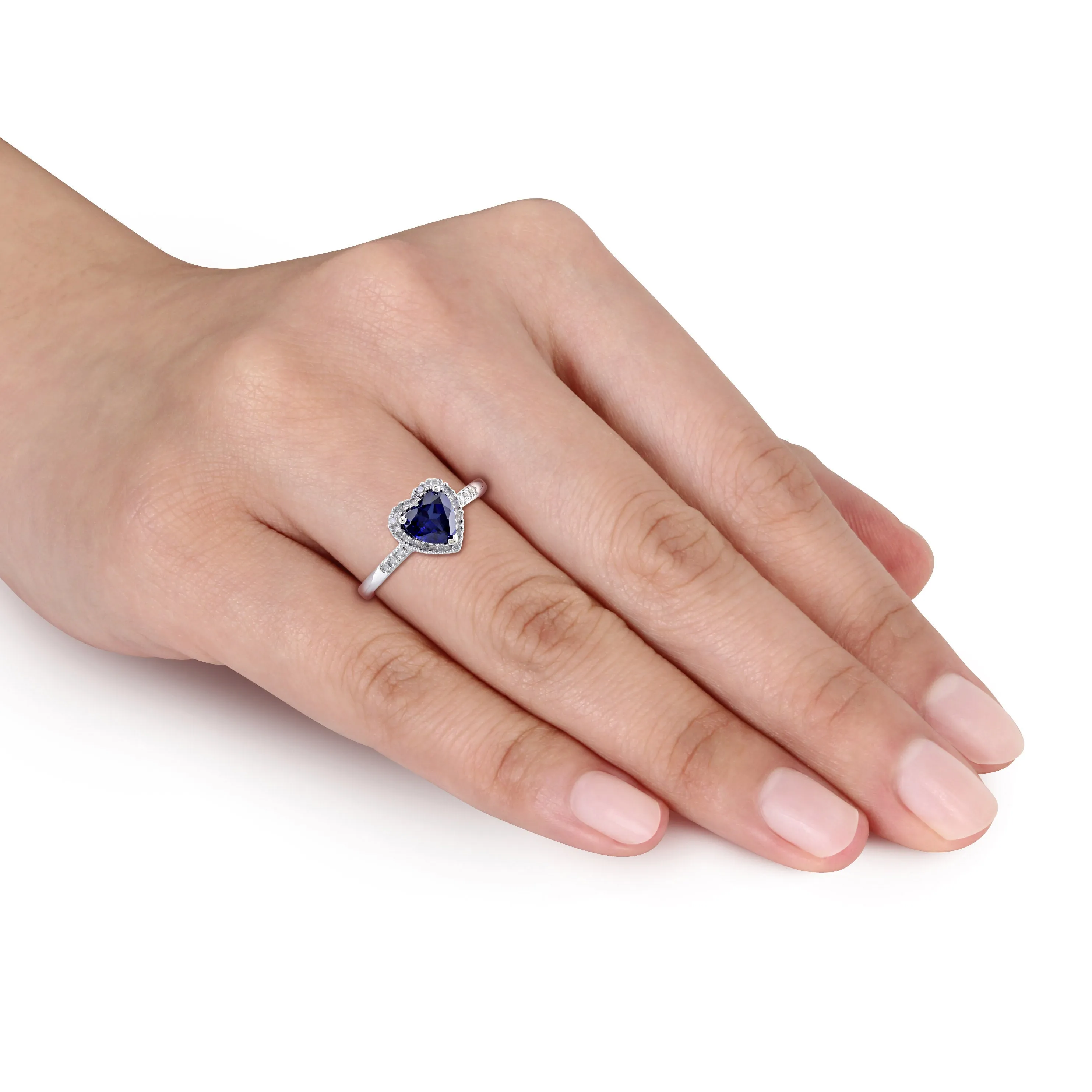 1/10 CT TW Halo Diamond and 7/8 CT TGW Heart Shaped Created Blue Sapphire Ring in 10K White Gold