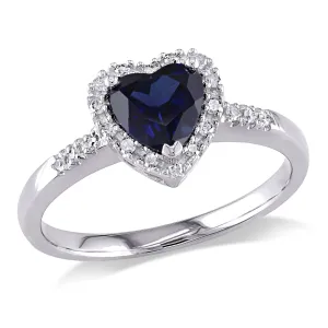 1/10 CT TW Halo Diamond and 7/8 CT TGW Heart Shaped Created Blue Sapphire Ring in 10K White Gold