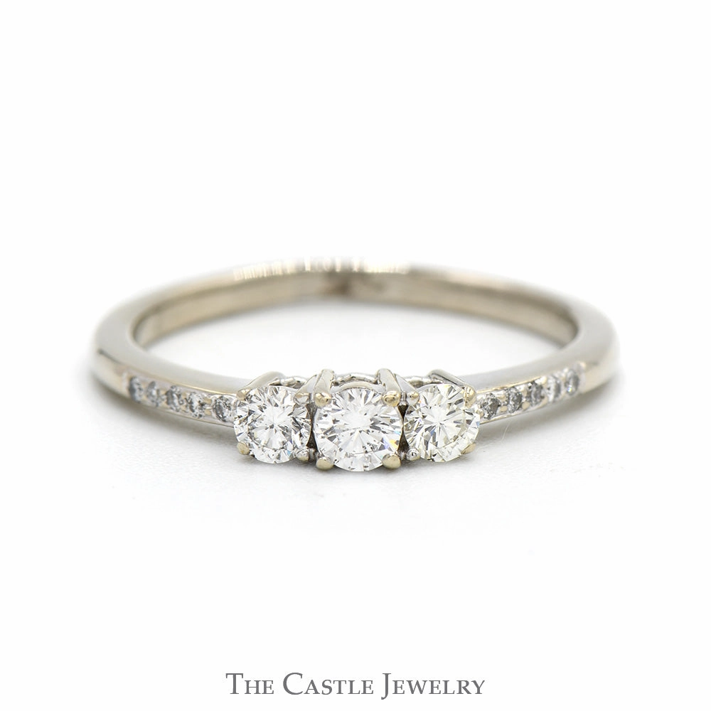New Age Custom Memento 1/2cttw Three Stone Diamond Engagement Ring with Diamond Accented Sides in 10k White Gold