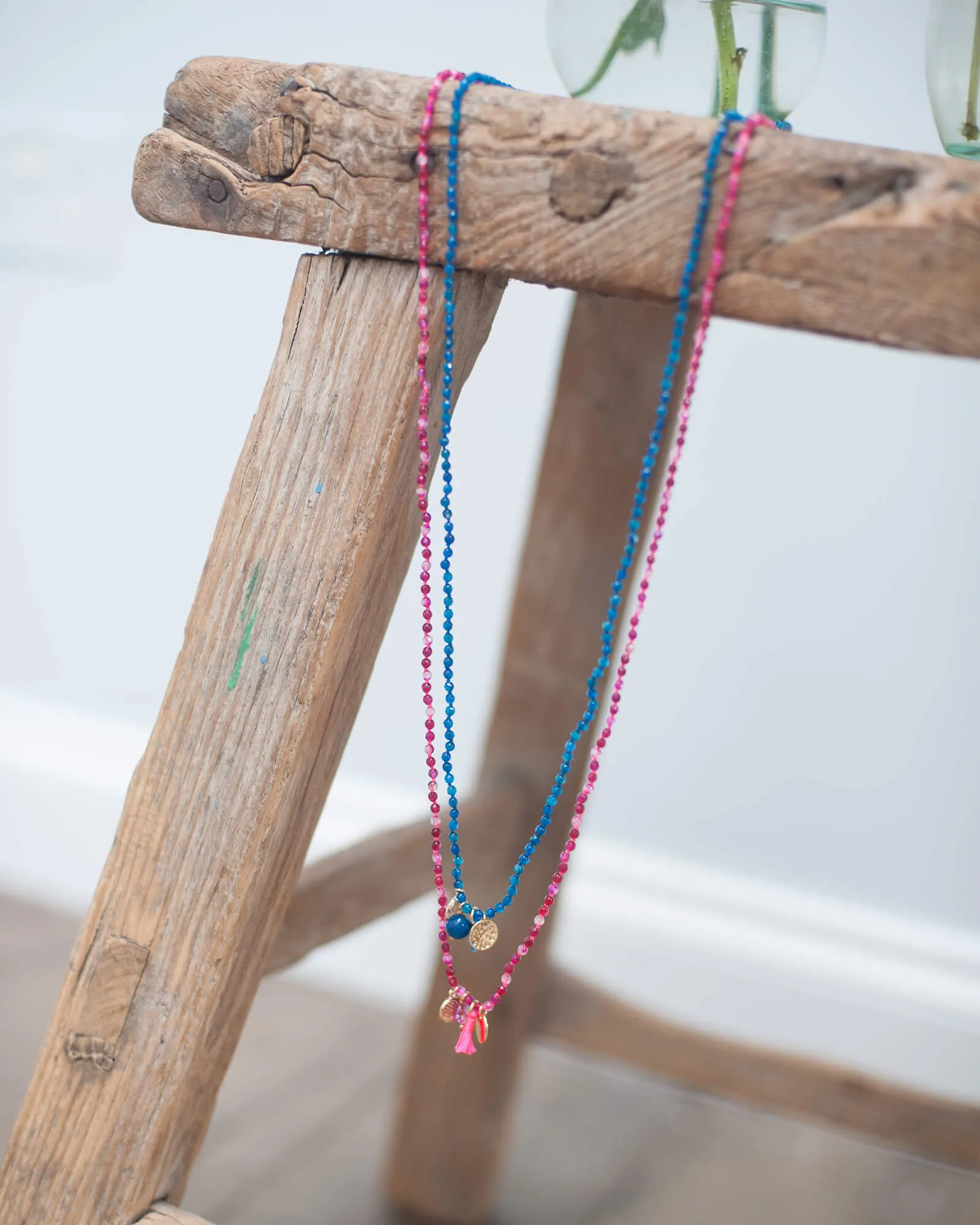 2250 Long necklace with charms and tassels in pink