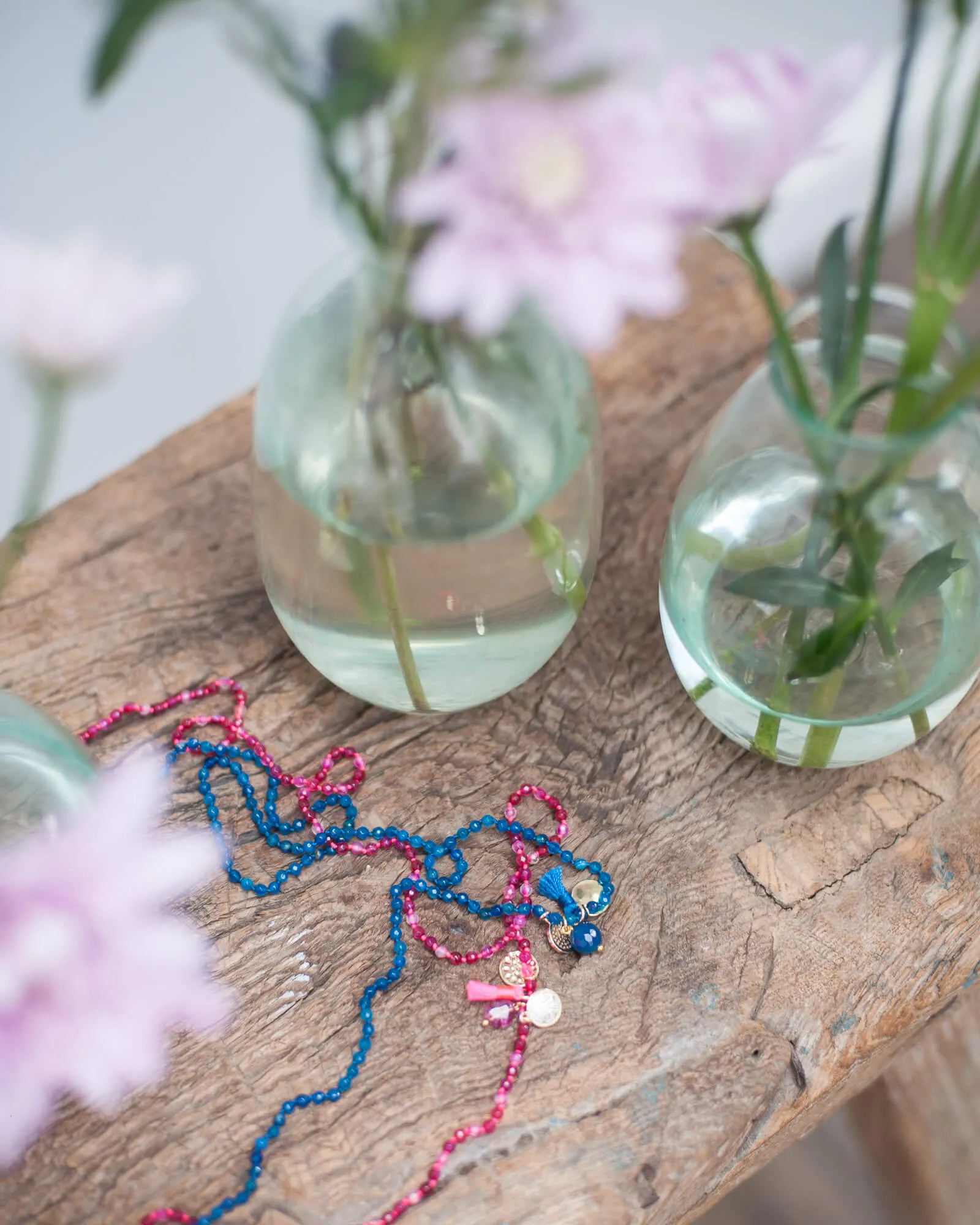 2250 Long necklace with charms and tassels in pink