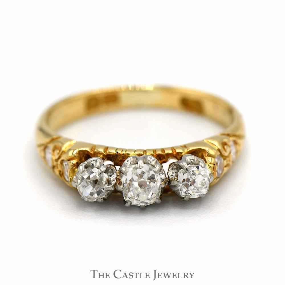 3 Stone Old Mine Cut Diamond Ring with Diamond Accented Sides in 10k Yellow Gold Excellent Symbol