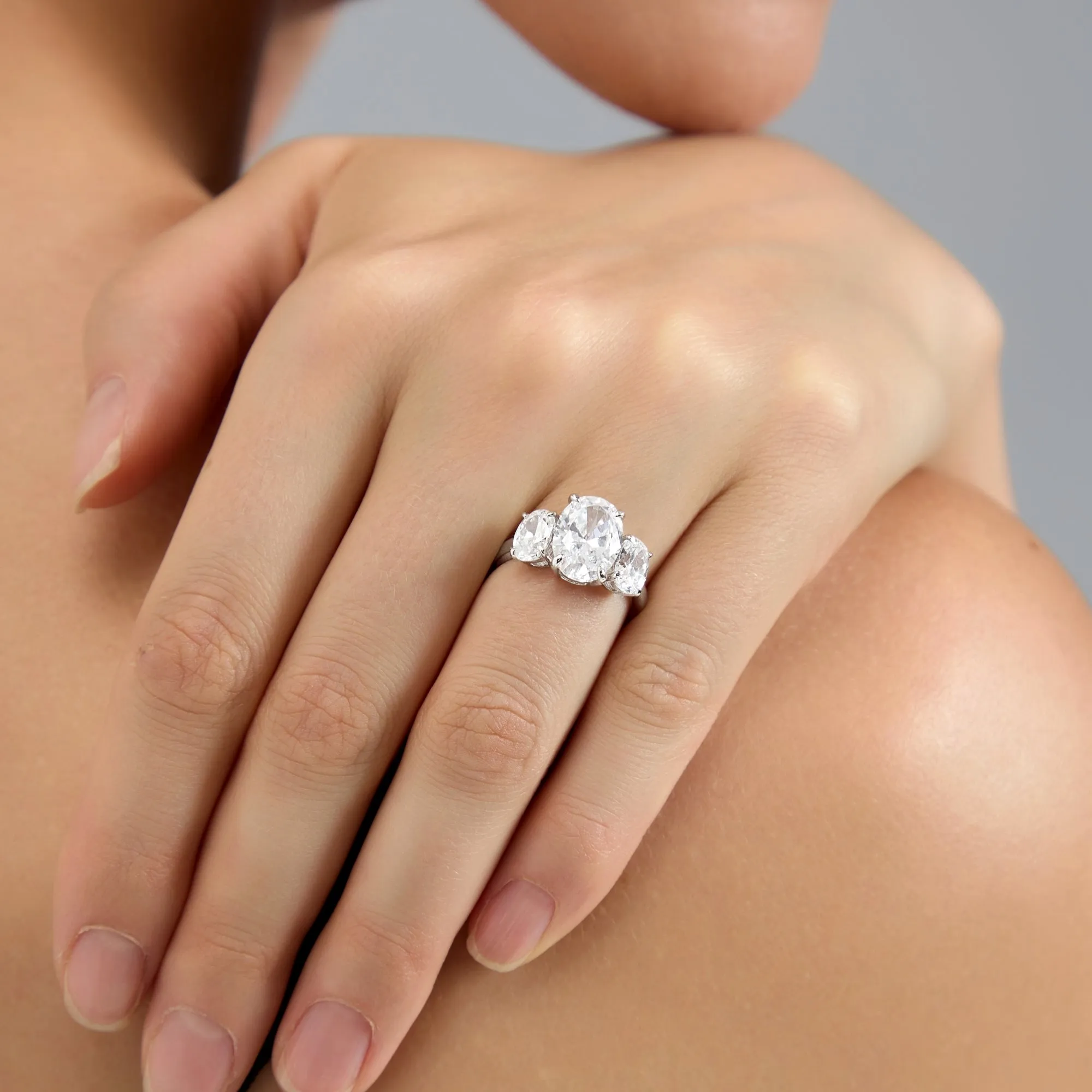 4 Carat TW Oval Cut Three Stone Engagement Ring