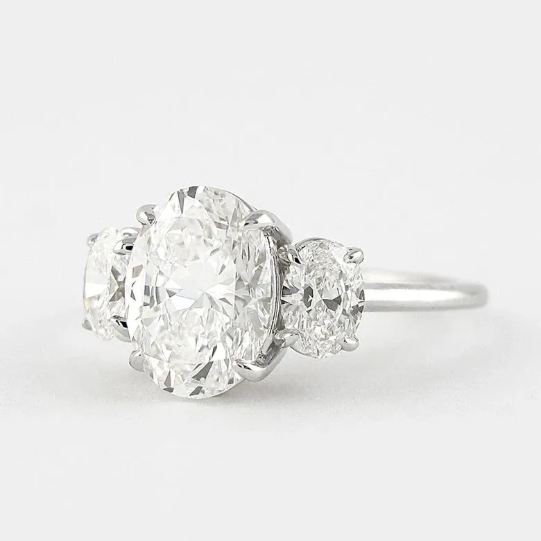 4 Carat TW Oval Cut Three Stone Engagement Ring