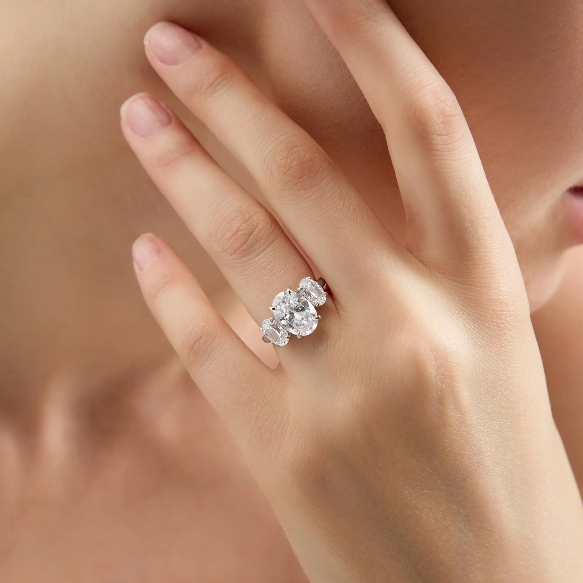 4 Carat TW Oval Cut Three Stone Engagement Ring