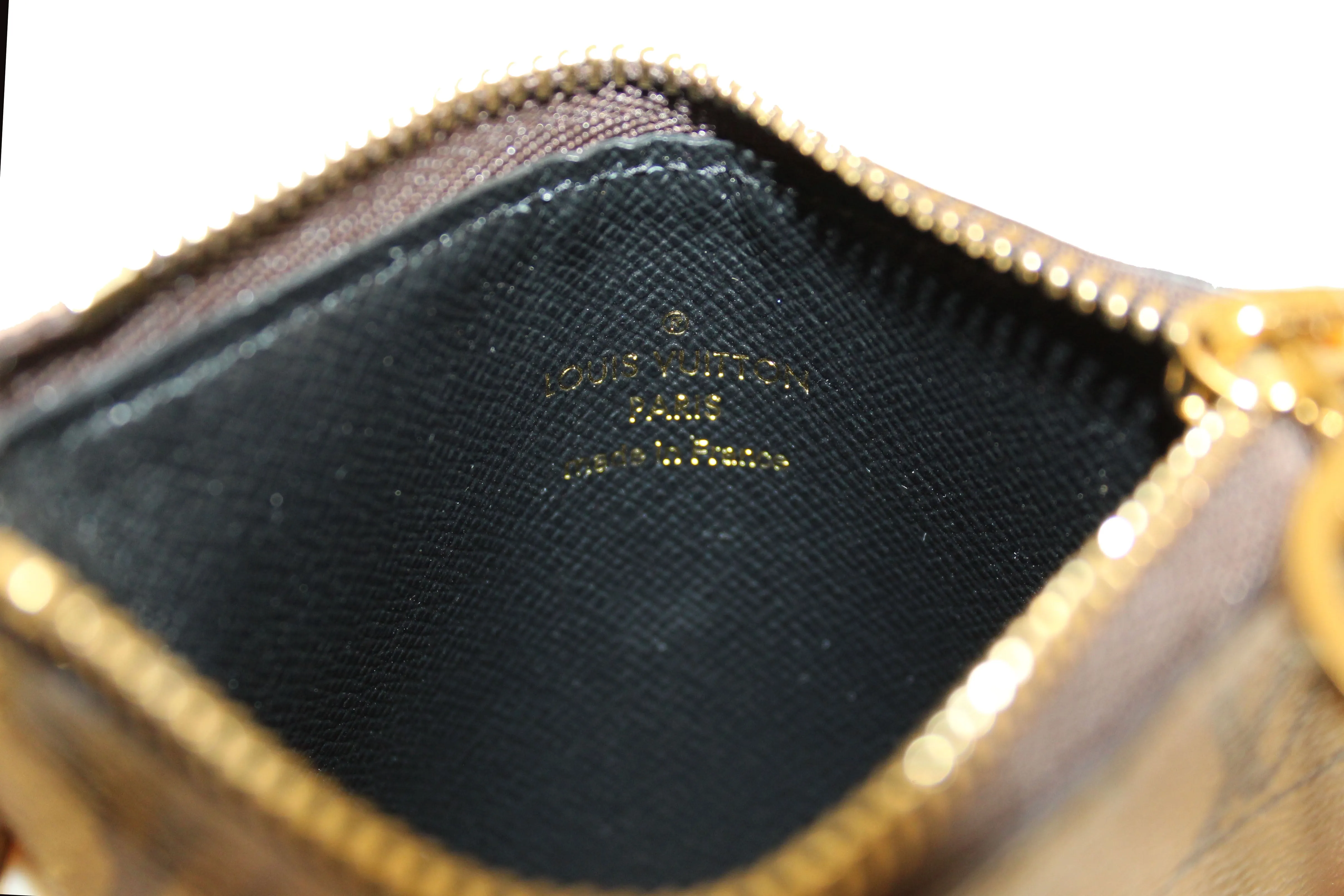 Authentic Louis Vuitton Monogram Giant/Monogram Reverse Canvas Trio Pouch