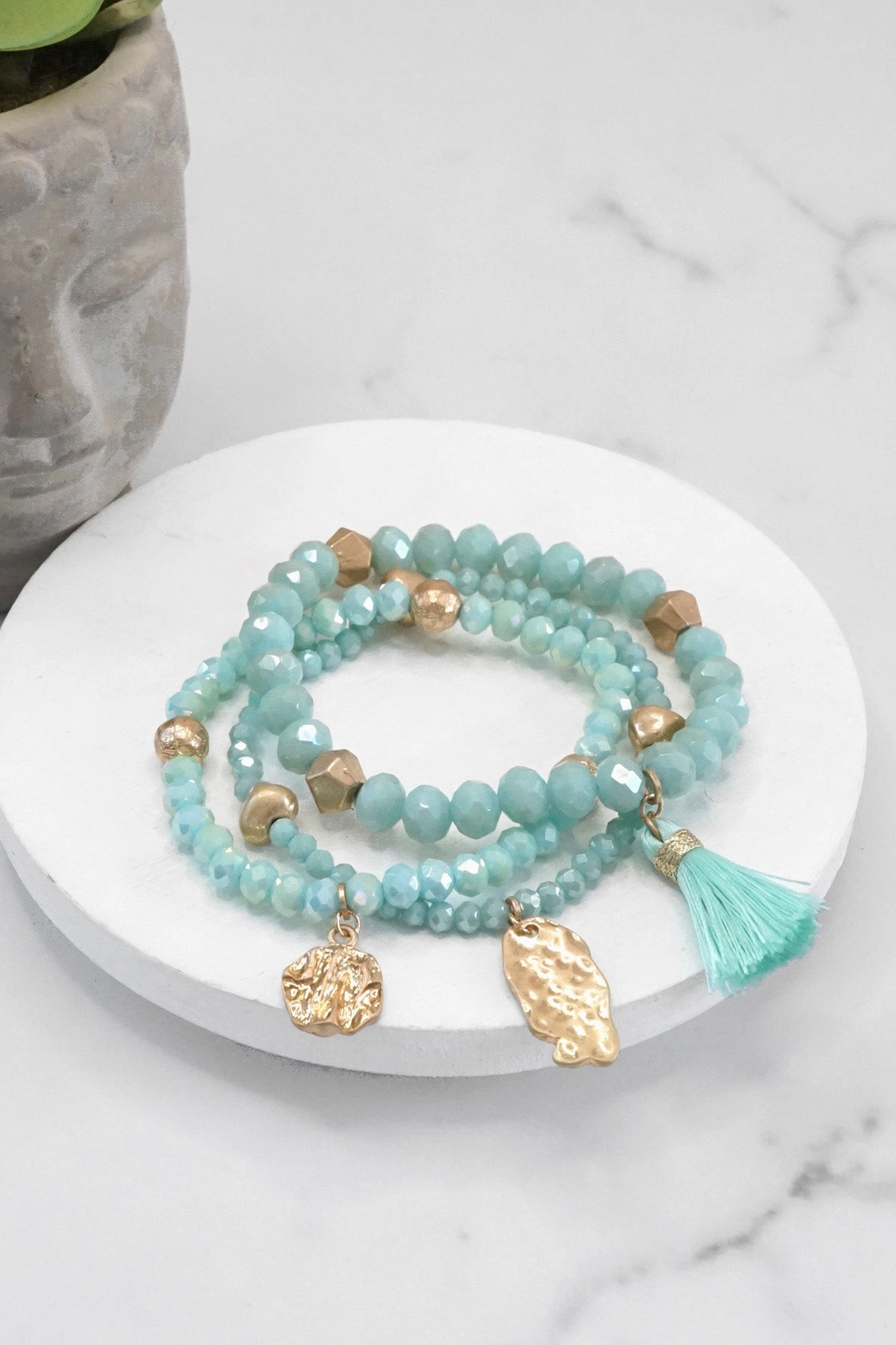 Just Cost Beaded bracelet stack with tassel and coins Aqua Taupe Rose