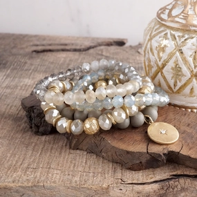 Beaded bracelets set in Gray with a coin charm Heritage Celebrated Next Big Thing