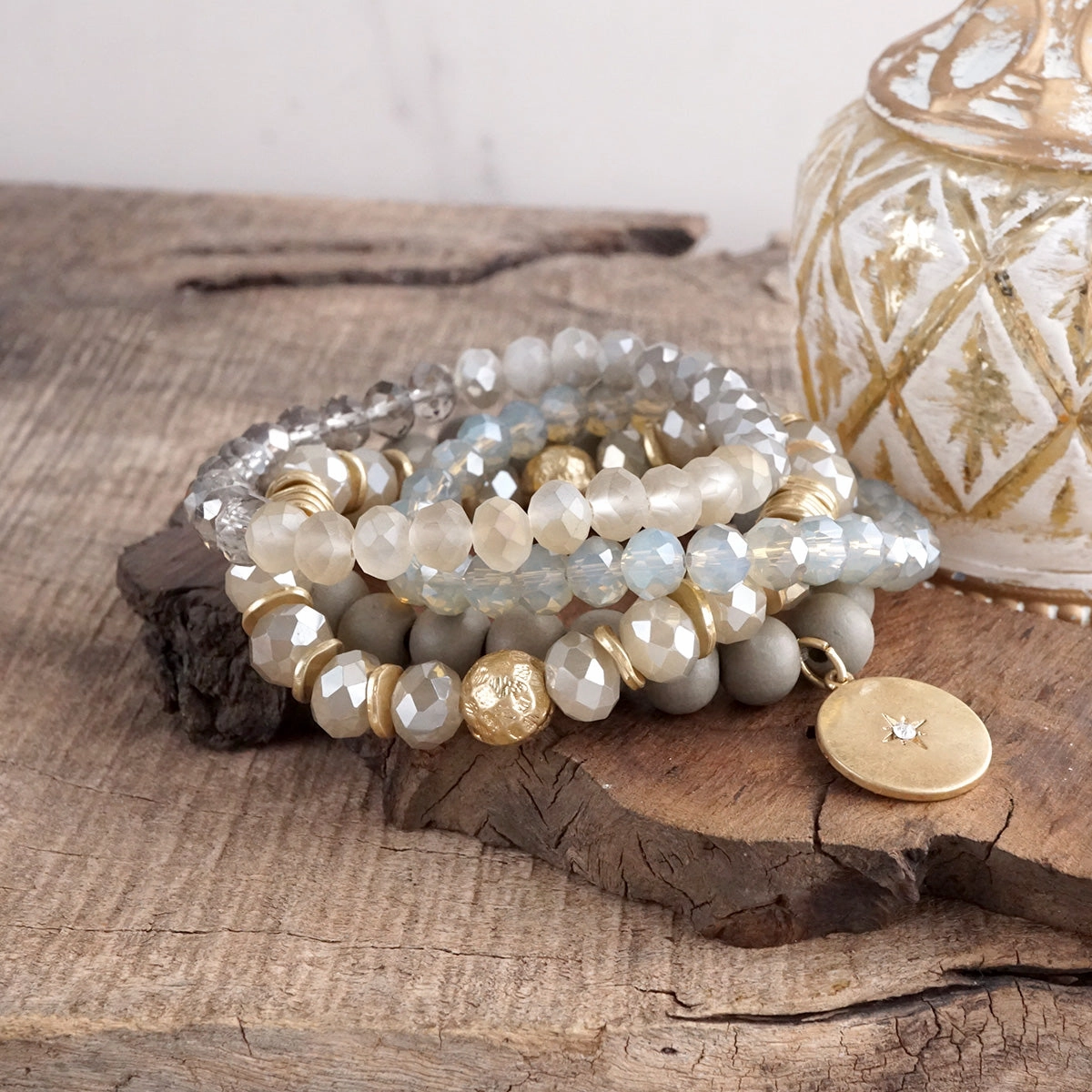 Beaded bracelets set in Gray with a coin charm Heritage Celebrated Next Big Thing