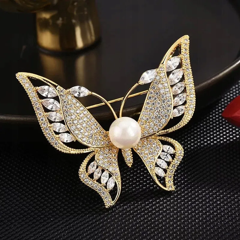 Butterfly gold plated brooch with zircons
