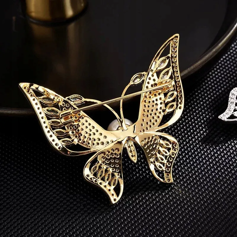 Butterfly gold plated brooch with zircons