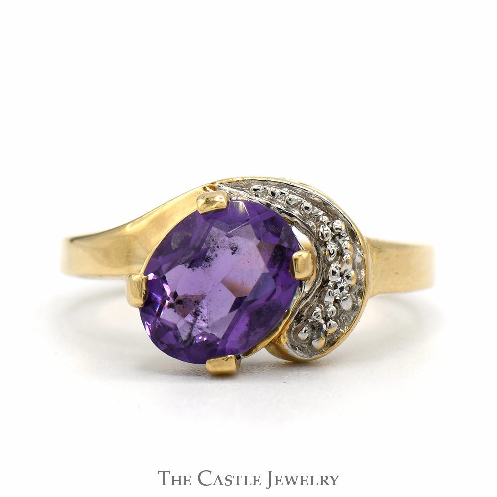 Oval Cut Amethyst Ring with Diamond Accented Swirled Design in 14k Yellow Gold Personal Statement