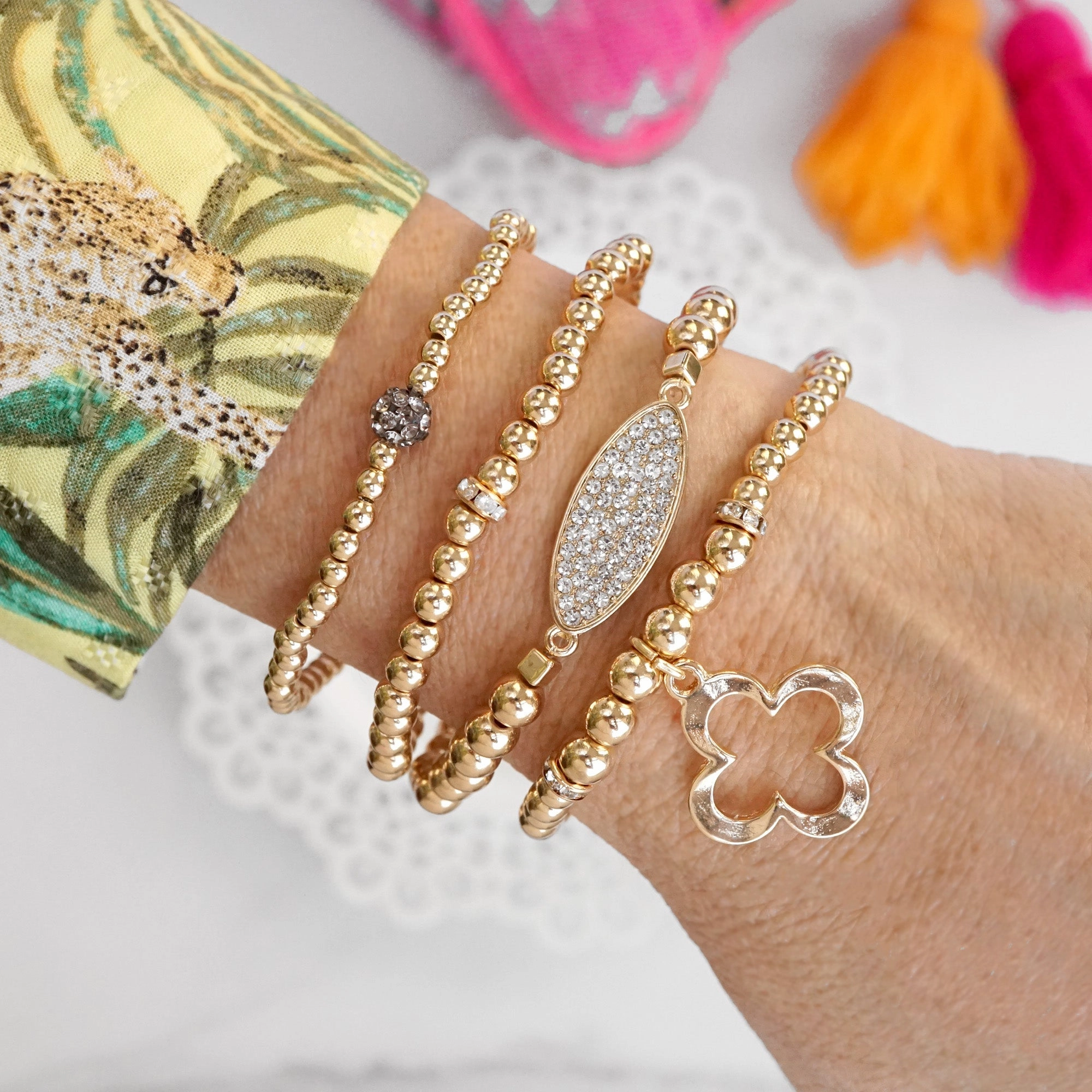 Laser Cutouts Clover and ball beads Bracelet Set with crystals in gold tone