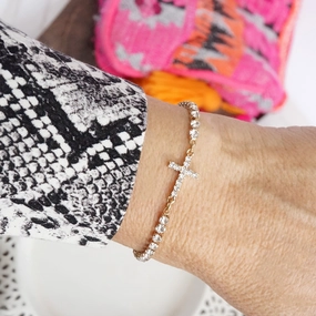 Established Perspective Cross charm friendship adjustable bracelet in Gold tone and crystals