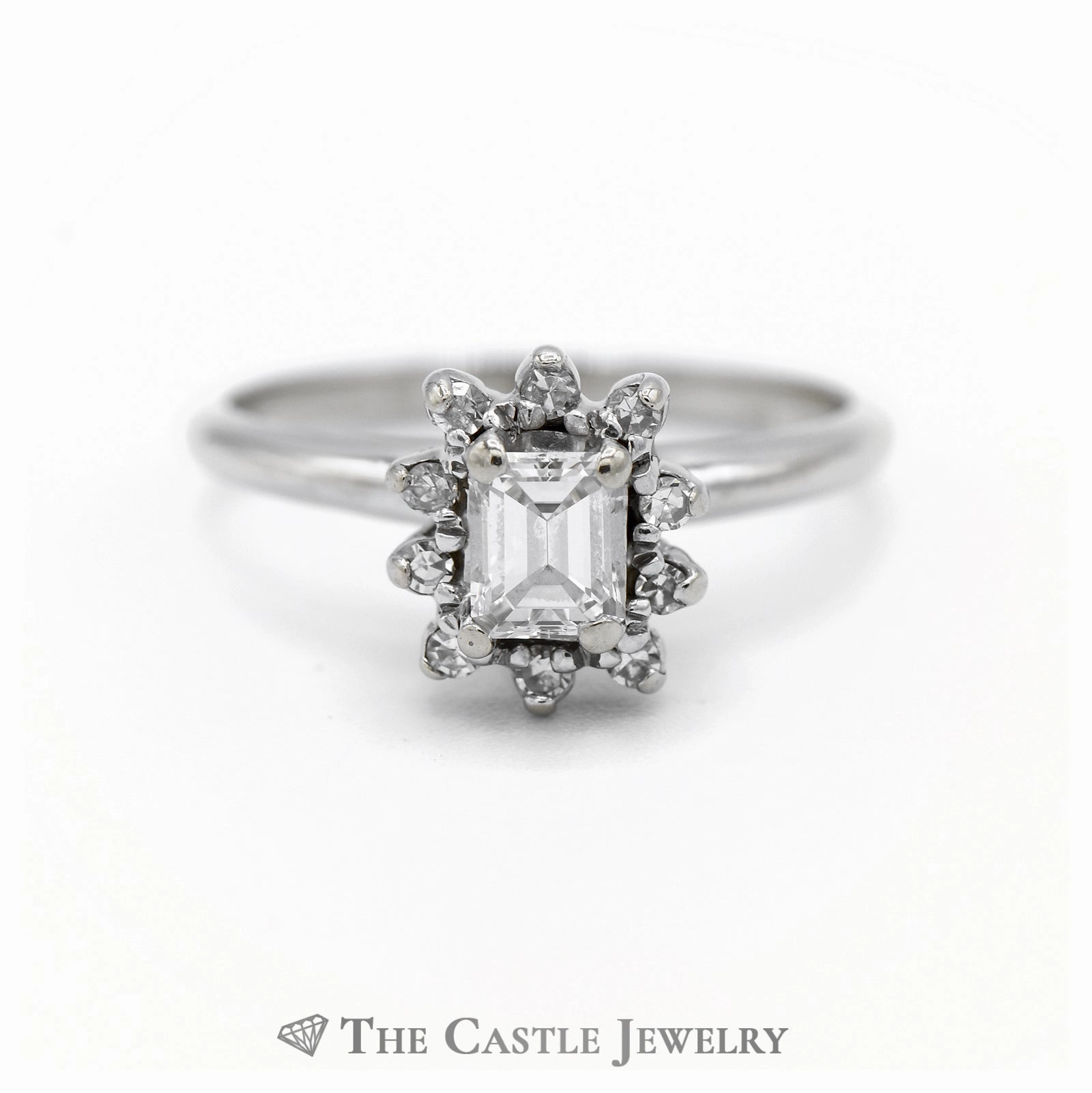 Elegant Movement Emerald Cut Diamond Engagement Ring with Diamond Halo