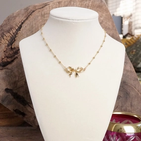 Creative Accent Fancy Bow Necklace - Short dainty station chain in gold tone