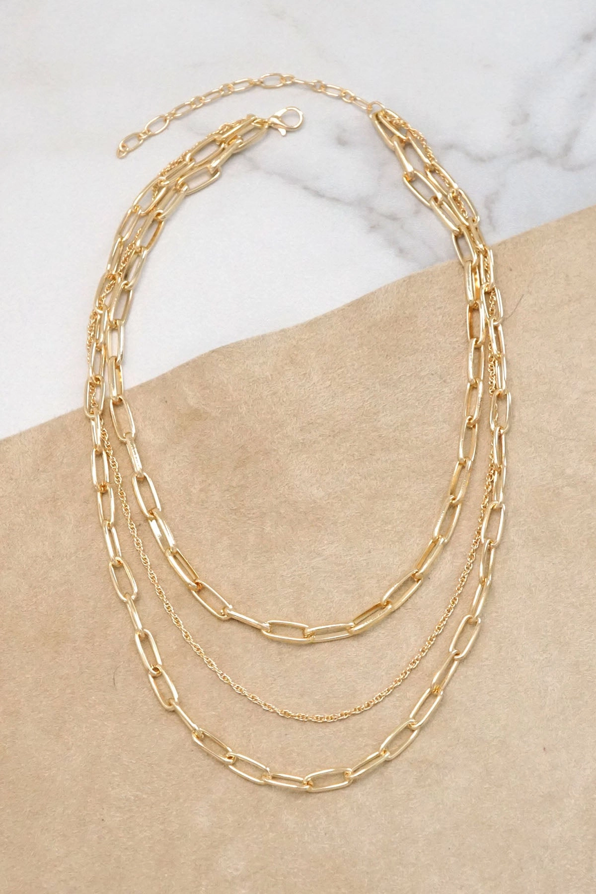 Layered gold tone chain short necklace Multicultural Piece