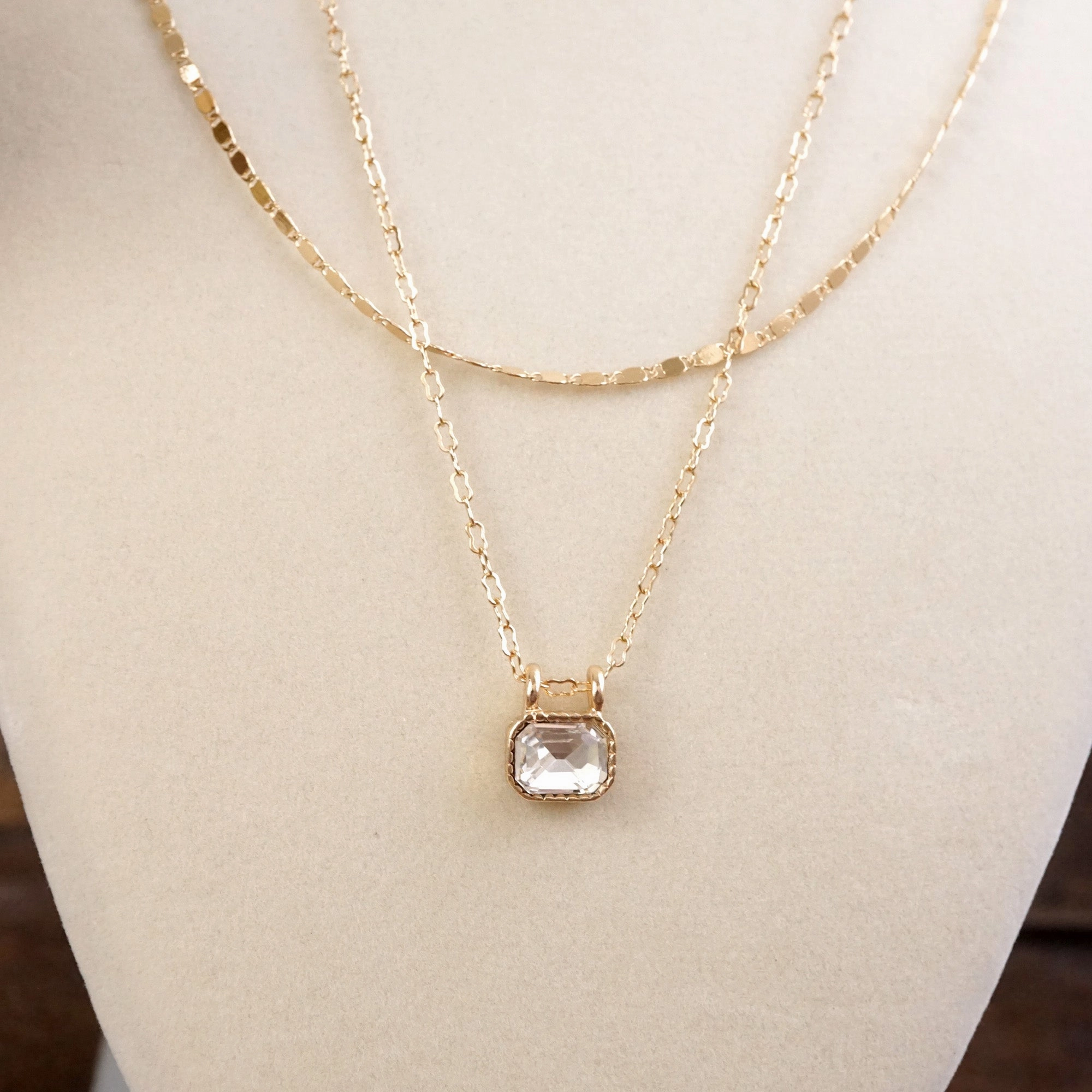 Glimmered Layers ?C Double Chain Necklace with Emerald-Cut Crystal Exclusive Adornment