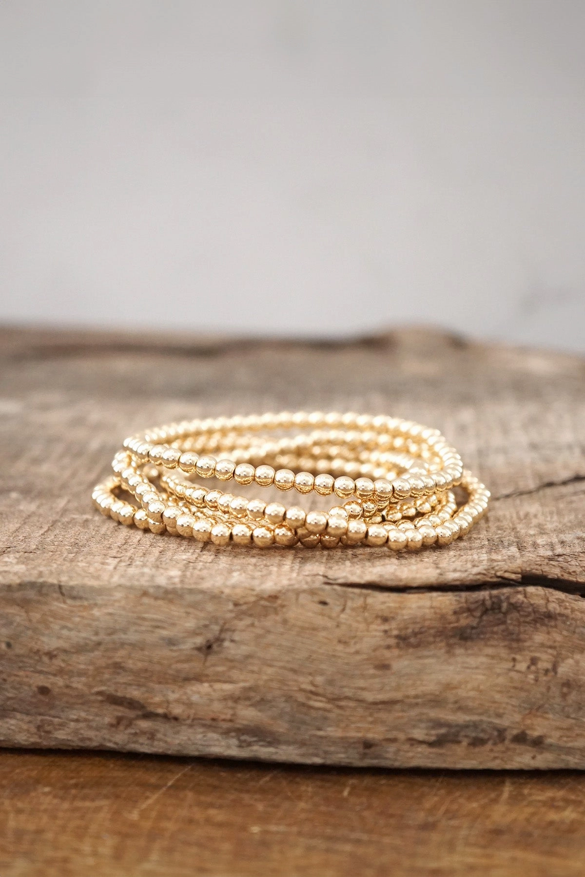 Continuous Mixes Good Composites Gold tone small ball beads bracelet stack of 5 bracelets