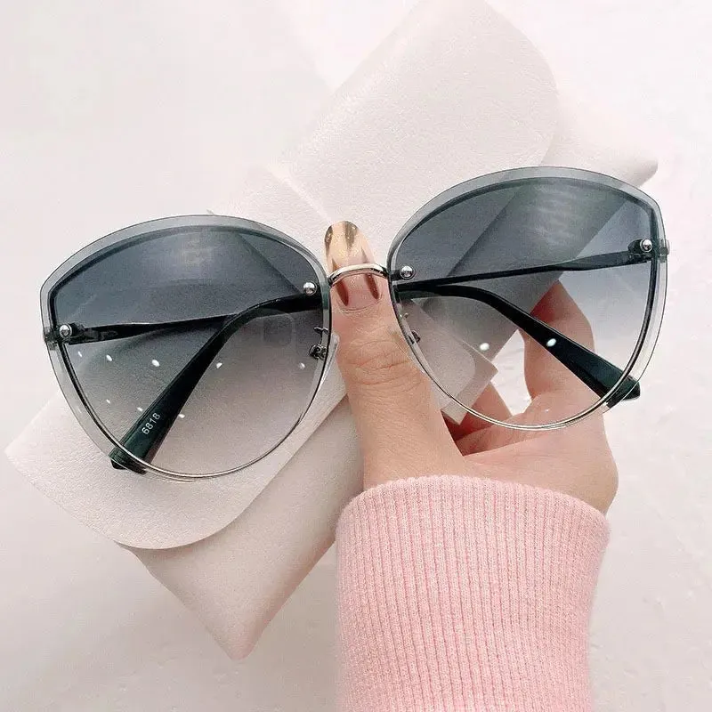 High Quality women's Oval Rimless Sunglasses Lady Metal Cay Eye Shades for Women Driving Glasses Sonnenbrille zonnebril dames