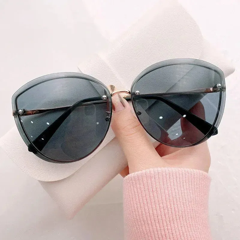 High Quality women's Oval Rimless Sunglasses Lady Metal Cay Eye Shades for Women Driving Glasses Sonnenbrille zonnebril dames