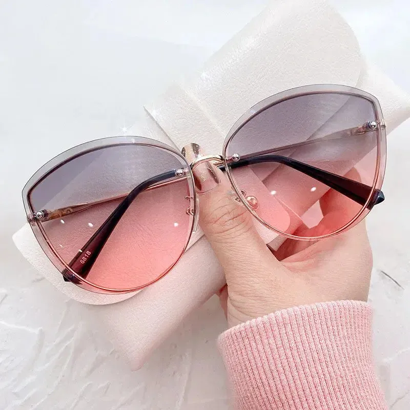 High Quality women's Oval Rimless Sunglasses Lady Metal Cay Eye Shades for Women Driving Glasses Sonnenbrille zonnebril dames