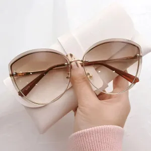 High Quality women's Oval Rimless Sunglasses Lady Metal Cay Eye Shades for Women Driving Glasses Sonnenbrille zonnebril dames