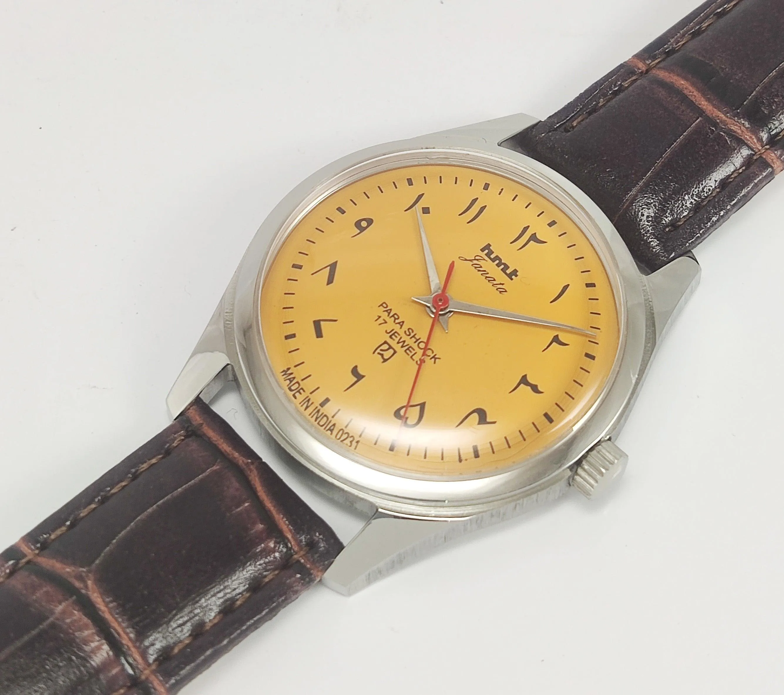 HMT Janata Para Shock 17 Jewels Urdu/Arabic Sun Yellow Dial Transparent Back Mechanical Hand winding Men's Wrist Watch
