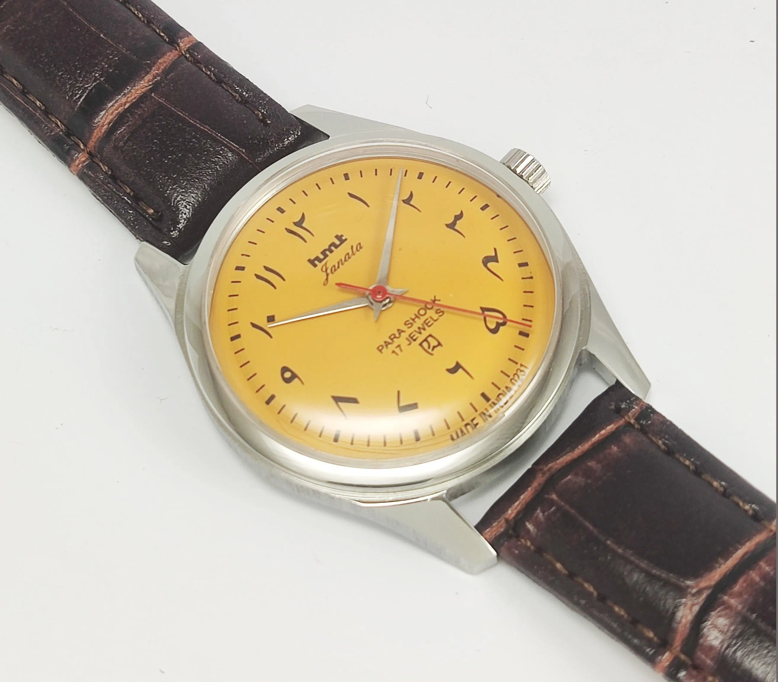 HMT Janata Para Shock 17 Jewels Urdu/Arabic Sun Yellow Dial Transparent Back Mechanical Hand winding Men's Wrist Watch
