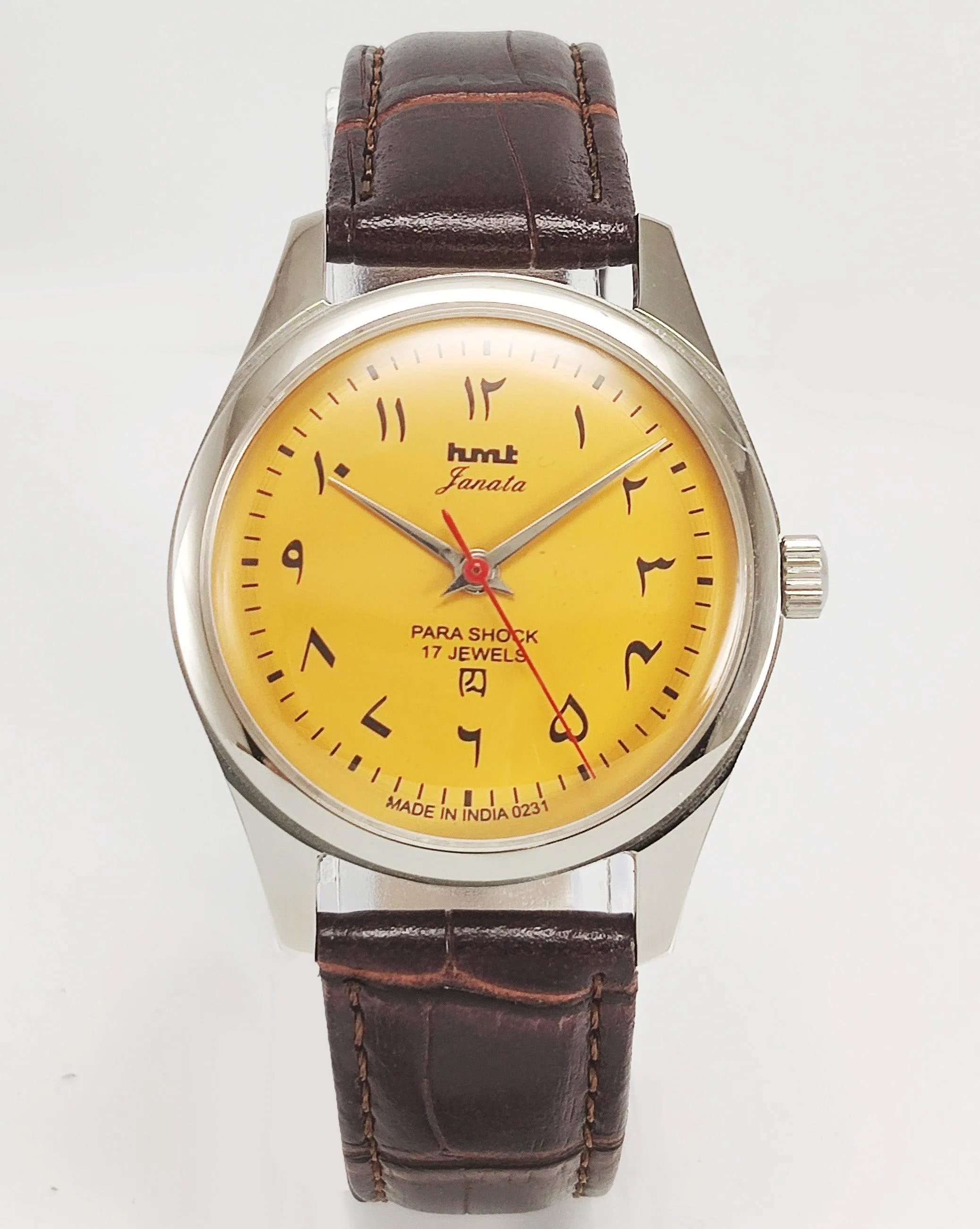 HMT Janata Para Shock 17 Jewels Urdu/Arabic Sun Yellow Dial Transparent Back Mechanical Hand winding Men's Wrist Watch