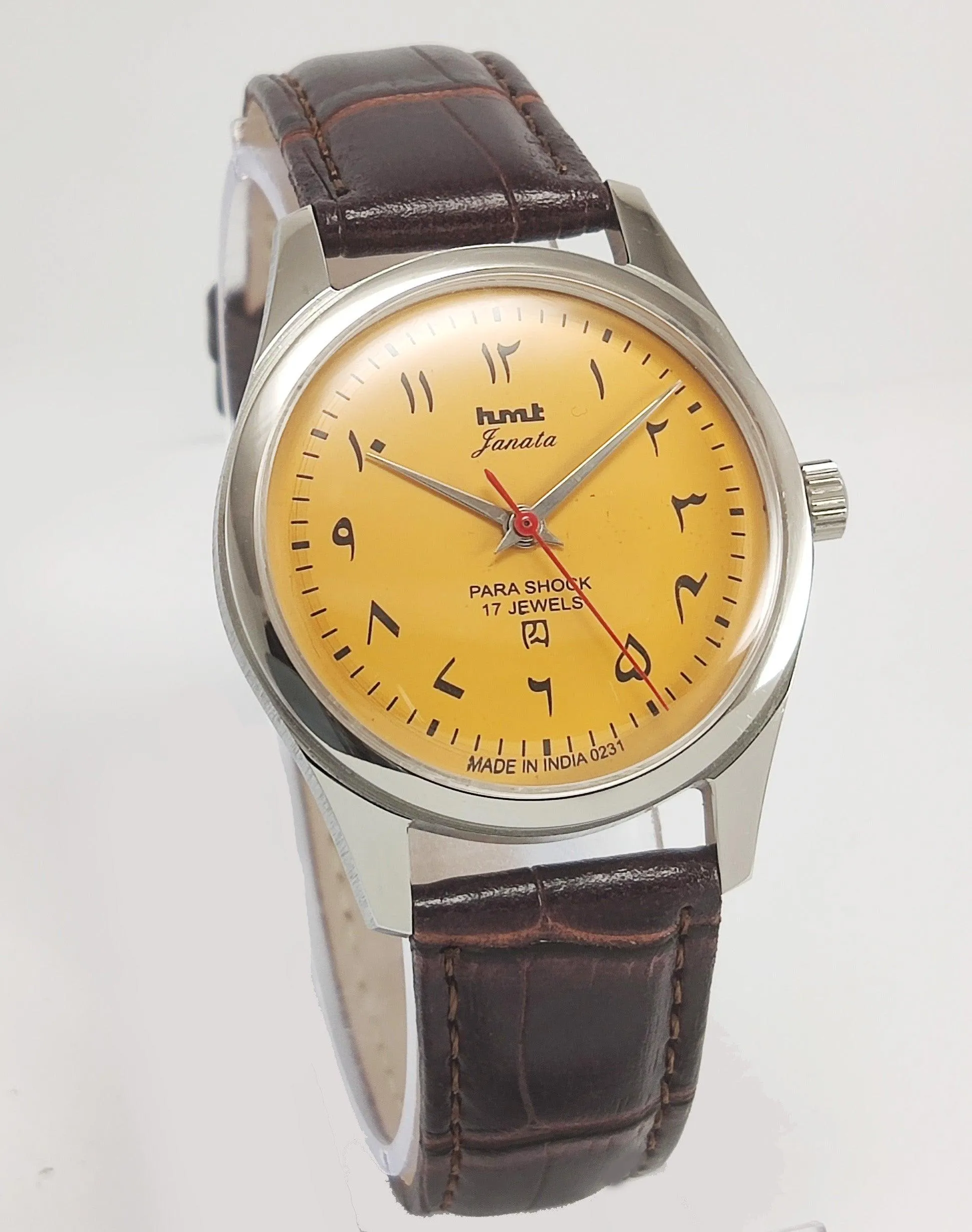 HMT Janata Para Shock 17 Jewels Urdu/Arabic Sun Yellow Dial Transparent Back Mechanical Hand winding Men's Wrist Watch