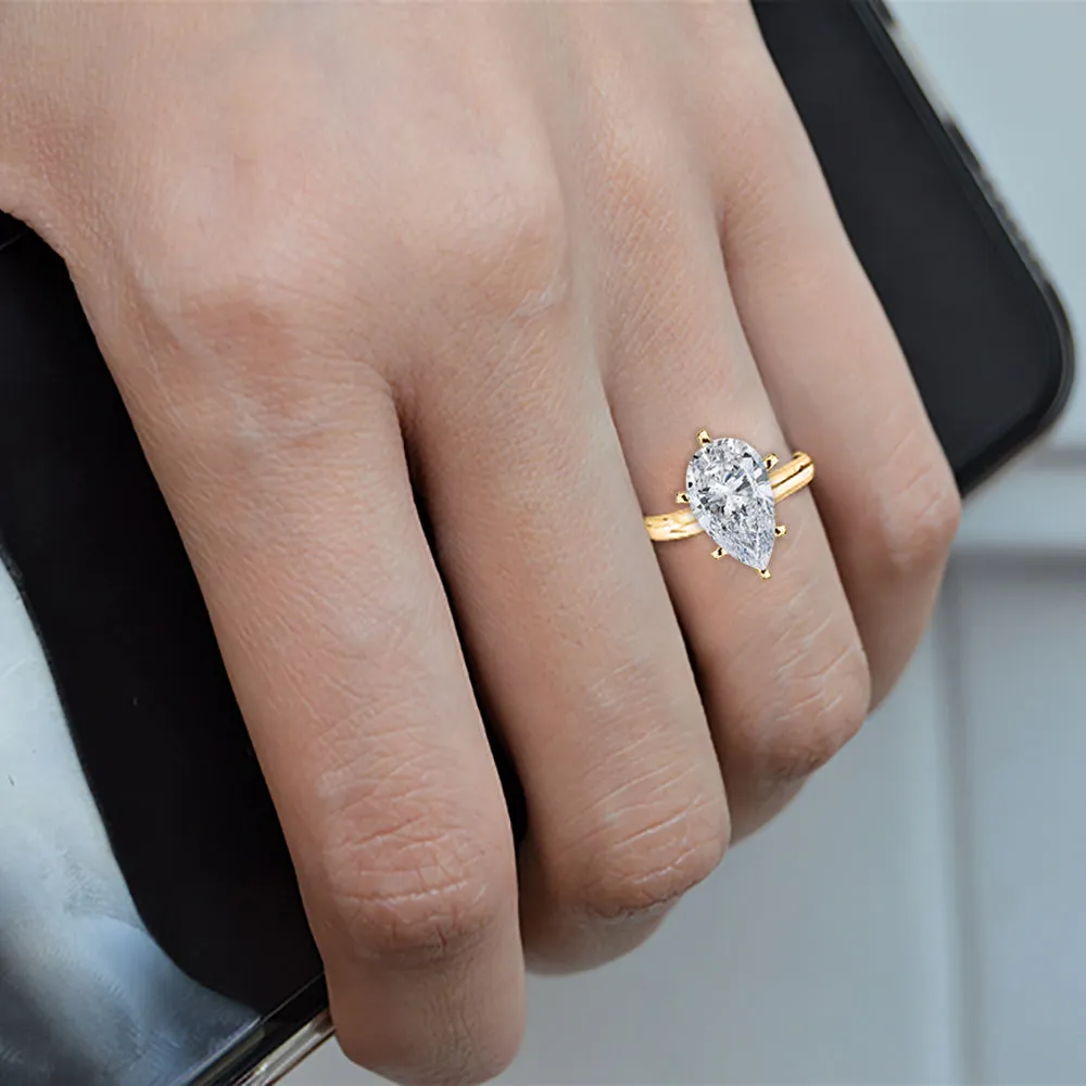 IGI Certified 1 ct. G - VVS2 Pear Cut Lab Grown Diamond Solitaire Engagement Ring in 14k Gold