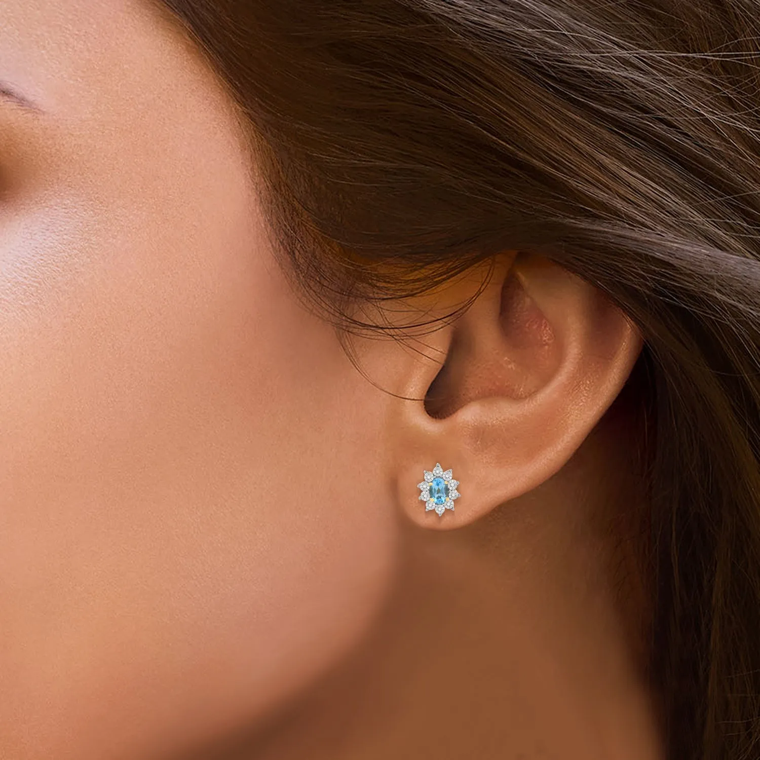 Jewelili 18K Yellow Gold over Sterling Sliver 6x4 MM Oval Created Aqua spinal and 1/20 Cttw Natural White Round Diamond Cluster Stud Earrings