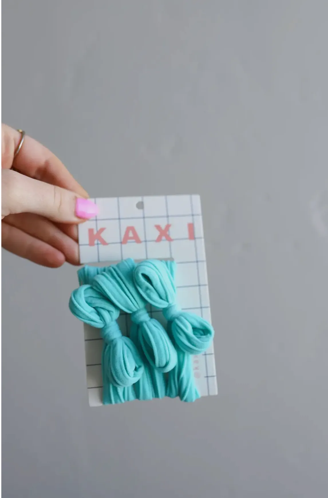 kaxi bow slick back ponytails