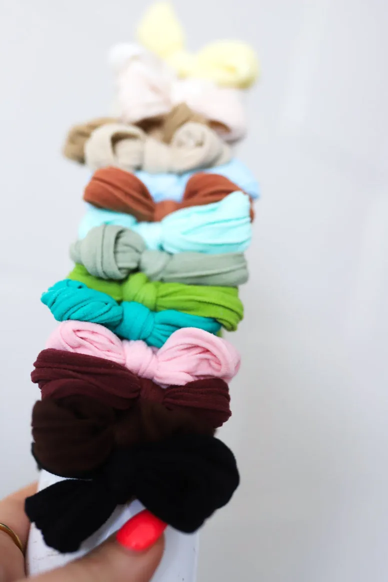 kaxi bow slick back ponytails