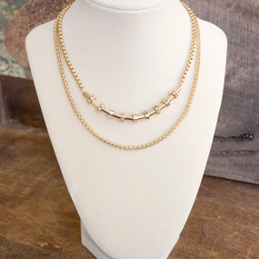 Layered Gold Chain Necklace with Cylinder and Crystal Accents Student Life