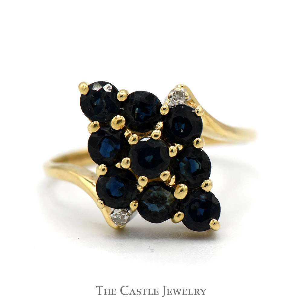 Personal Appearance Modern Piece Marquise Shaped Sapphire Cluster ring with Diamond Accents in 14k Yellow Gold Bypass Setting