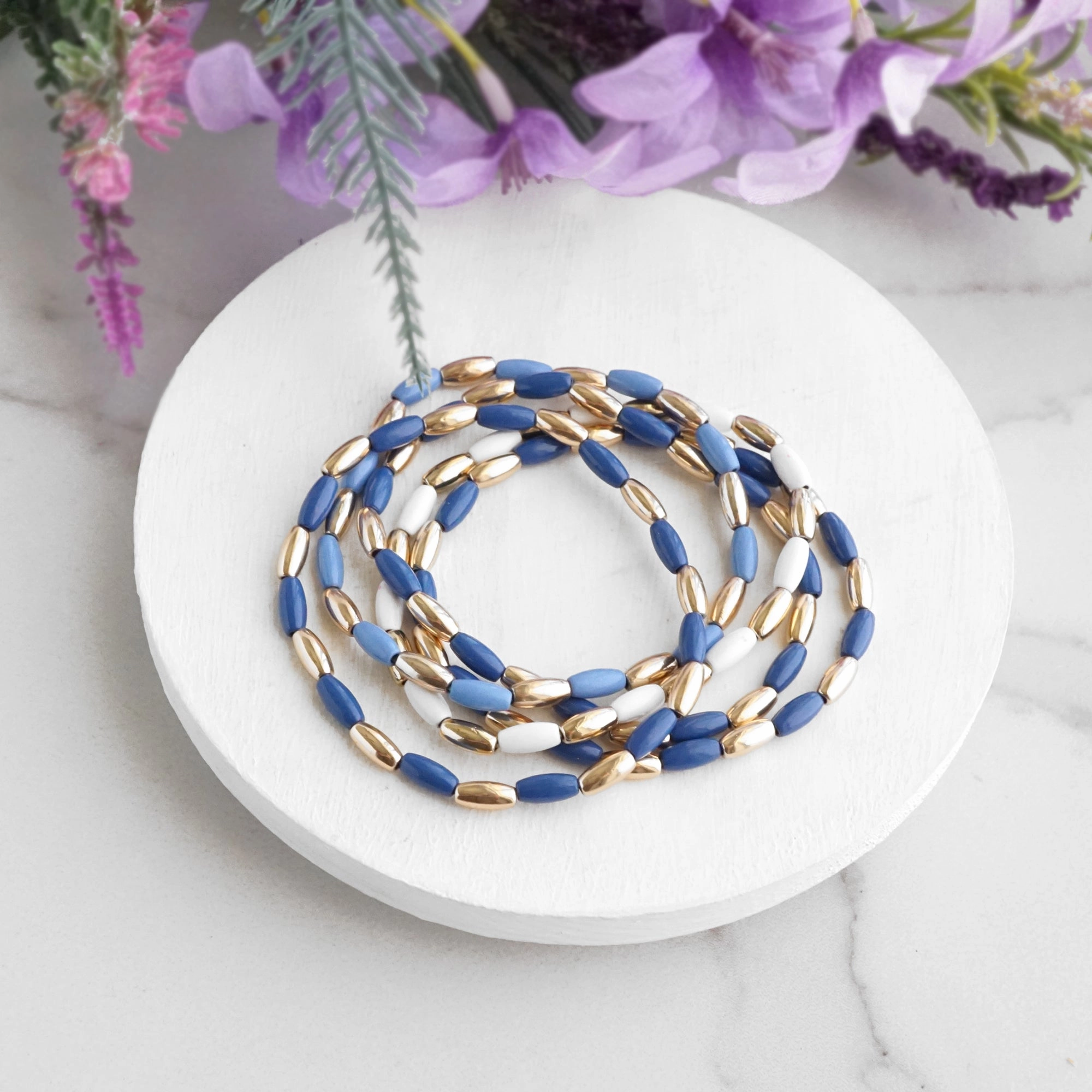 Unifying Detail Metal Beaded bracelet stack 5 bracelets - Blues and Gold tone