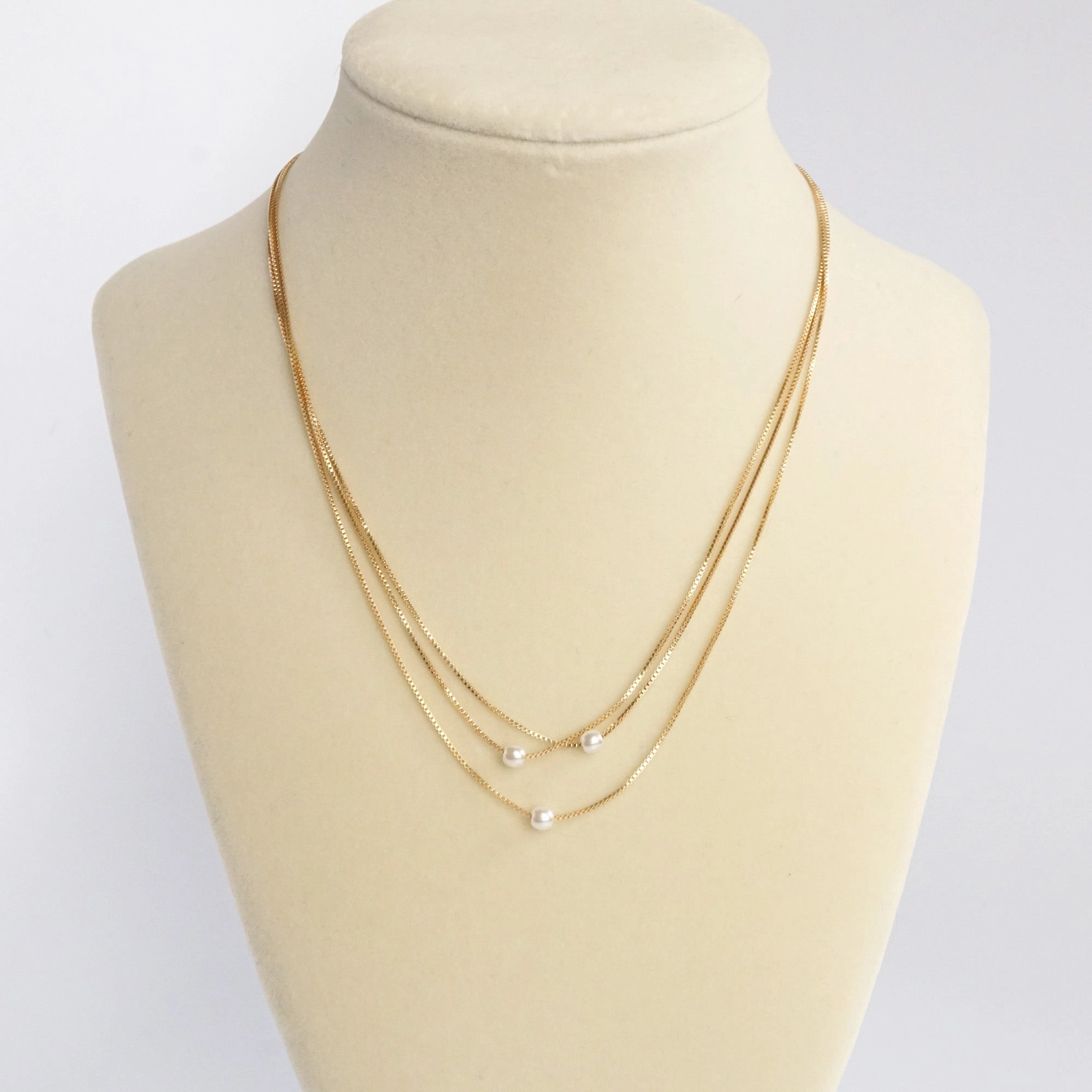 Smiling Face Multi chain short dainty necklace with 3 small pearls in gold tone