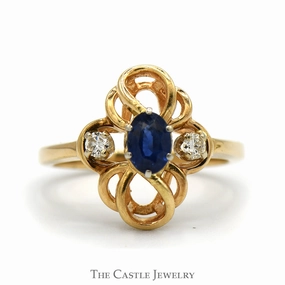 Oval Sapphire Ring with Diamond Accents in Interweaving Looped Design in 14k Yellow Gold Strong Look Traditional Ornament