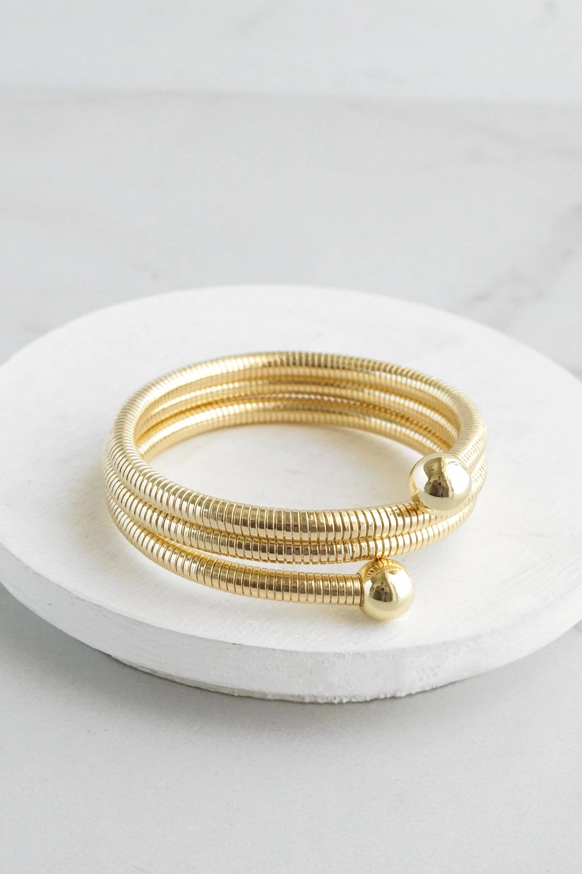 Uniform Standard Smart Buy Gold tone multi layer flexy coil bracelet bangle Snake chain