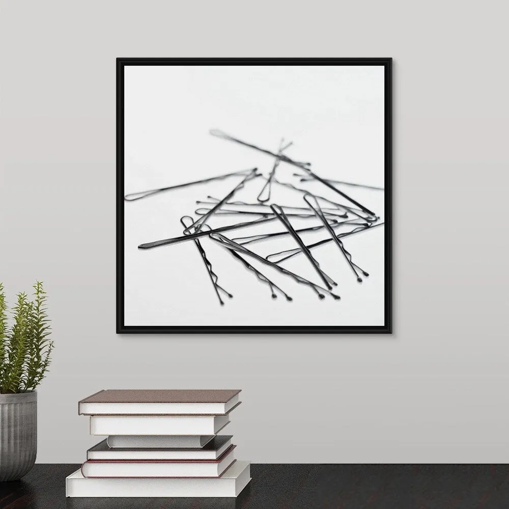 "Close-up of hair clips" Black Float Frame Canvas Art - Multi