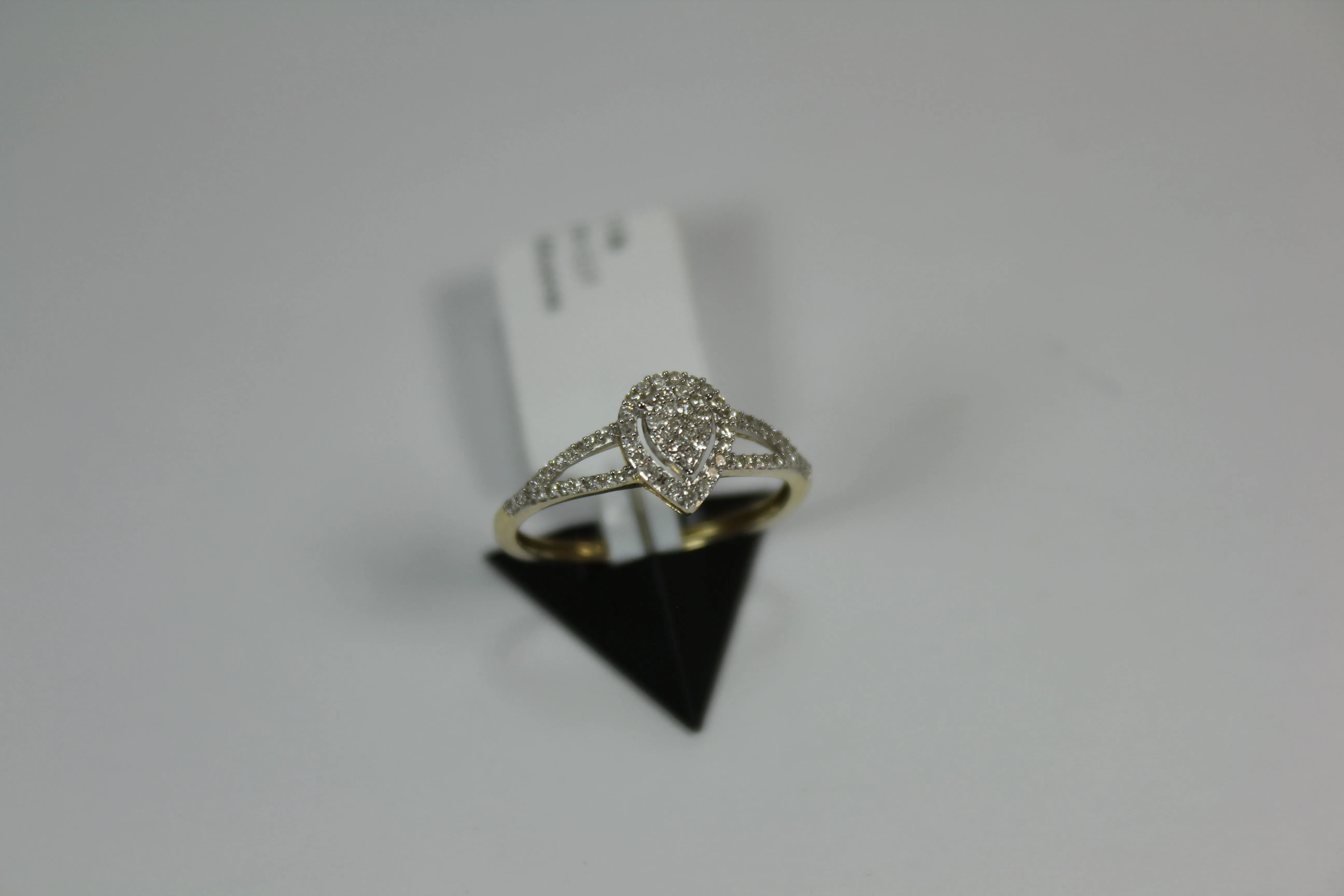 R0551: 10k 2 tone cluster for pear shaped engagement ring with 0.20ct diamond