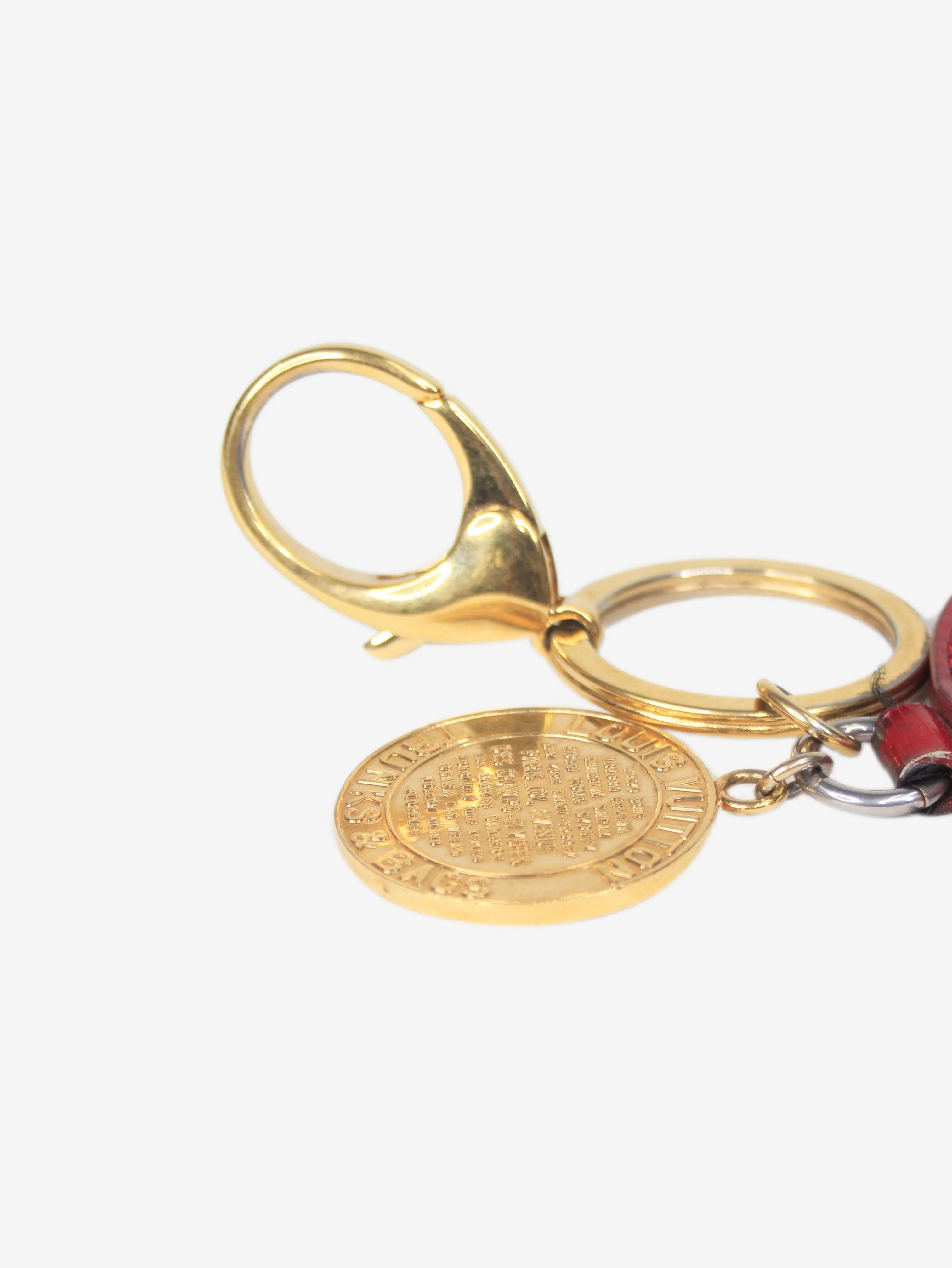 Red and gold Trunks & Bags keychain
