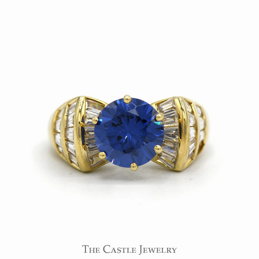 Round Synthetic Sapphire Ring with Channel Set Baguette Cut Cubic Zirconia Accents in 10k Yellow Gold Polished Motion Trendy Vibe