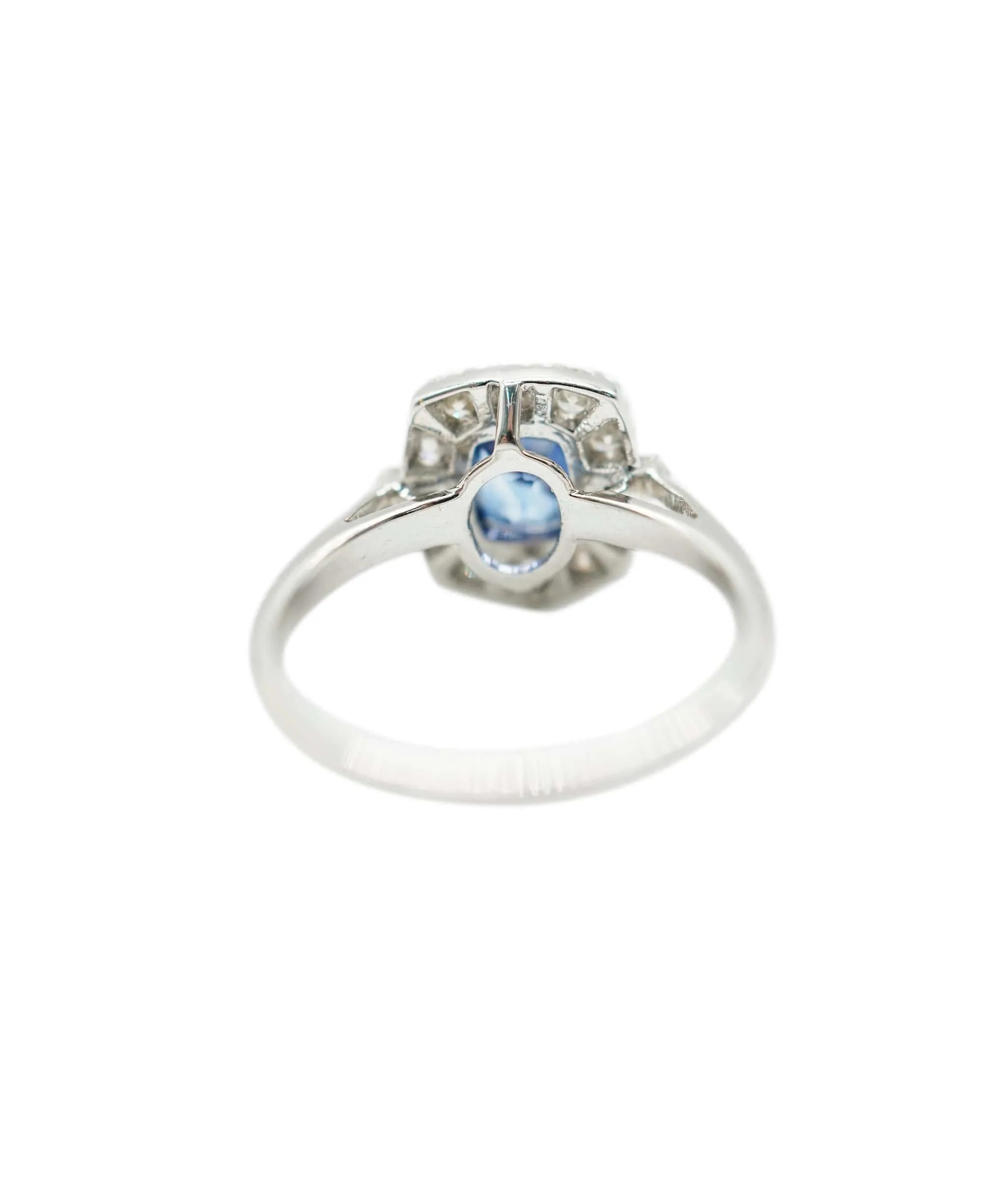 Sapphire (0.95ct) and diamond (apx 0.45ct total) cluster ring 18K WG AHC1191