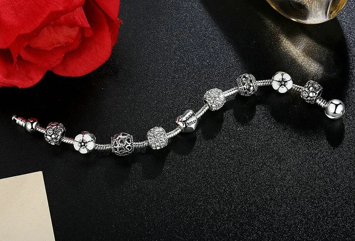 Sophisticated Silver Charm Bracelet: Elegance Meets Versatility in Your Everyday Style