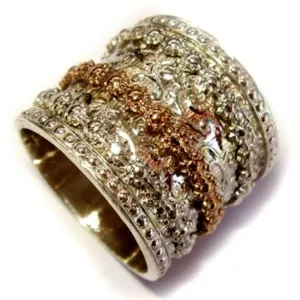 Spinner ring for woman. Israeli meditation rings using silver and gold.