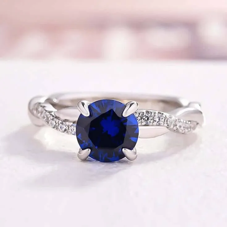 Twist 1.25 Carat Blue Sapphire Round Cut Promise Ring