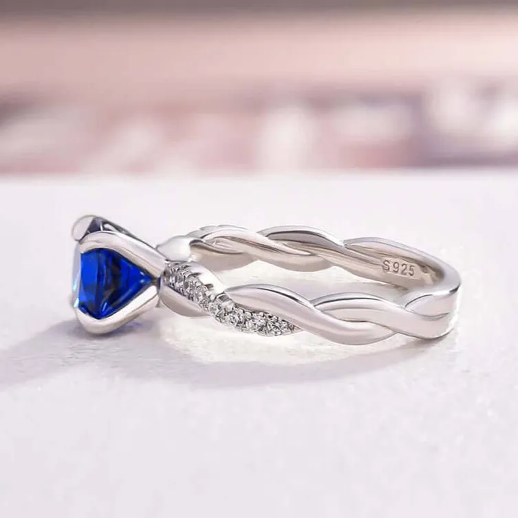 Twist 1.25 Carat Blue Sapphire Round Cut Promise Ring